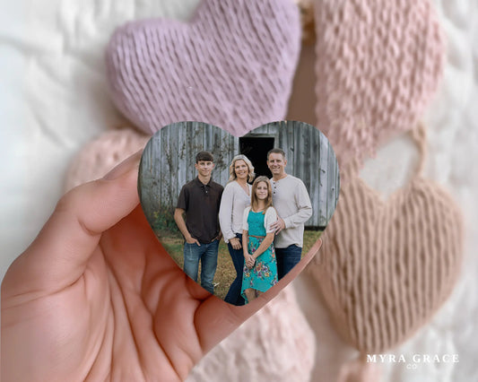 Heart-shaped custom family ceramic photo magnet on fridge – handmade personalized gift or Christmas fridge magnet. 