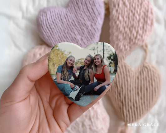 Heart-shaped custom friendship ceramic photo magnet on fridge – handmade personalized gift or Christmas fridge magnet. 