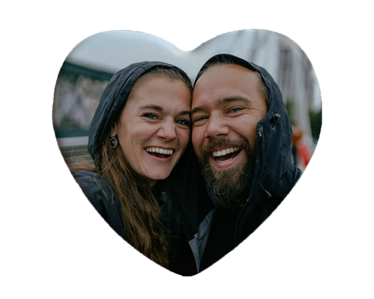 Heart-shaped custom couples ceramic photo magnet on fridge – handmade personalized gift or Christmas fridge magnet. 