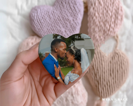 Heart-shaped custom wedding ceramic photo magnet on fridge – handmade personalized gift or Christmas fridge magnet. 