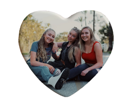 Heart-shaped custom friendship ceramic photo magnet on fridge – handmade personalized gift or Christmas fridge magnet. 
