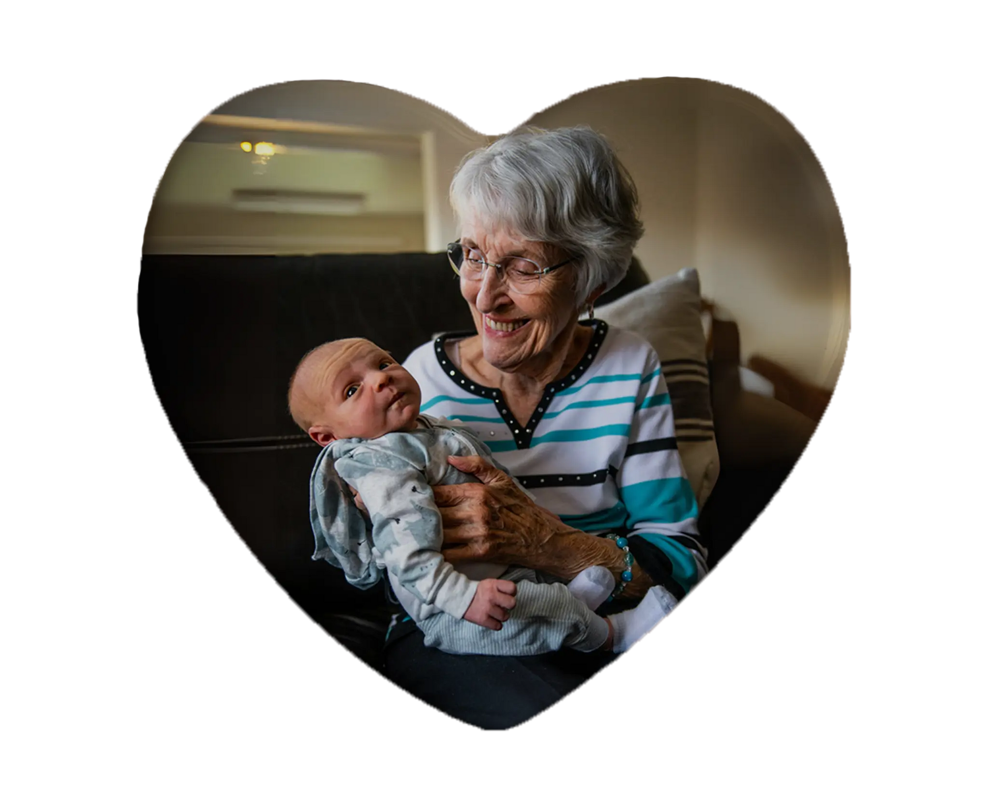 Heart-shaped custom grandma ceramic photo magnet on fridge – handmade personalized gift or Christmas fridge magnet. 