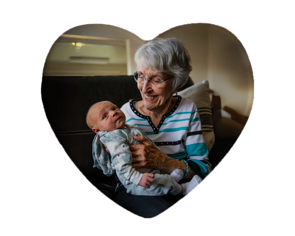 Heart-shaped custom grandma ceramic photo magnet on fridge – handmade personalized gift or Christmas fridge magnet. 